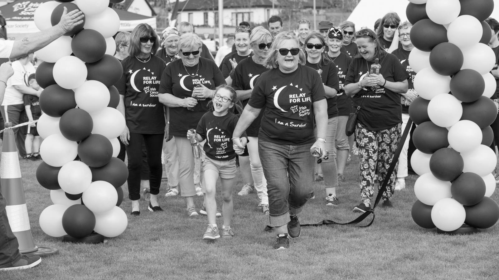 Cancer survivors walking at Relay For Life Midleton
