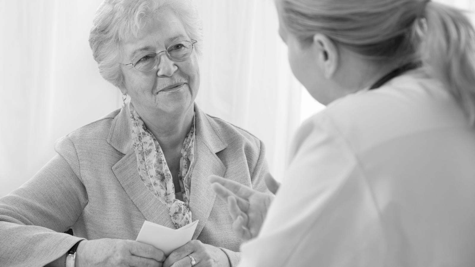 Older woman talking to her doctor